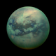Saturn’s largest moon, Titan. This is how the moon would look if its thick, hazy atmosphere was removed. (Image: NASA/Cassini)